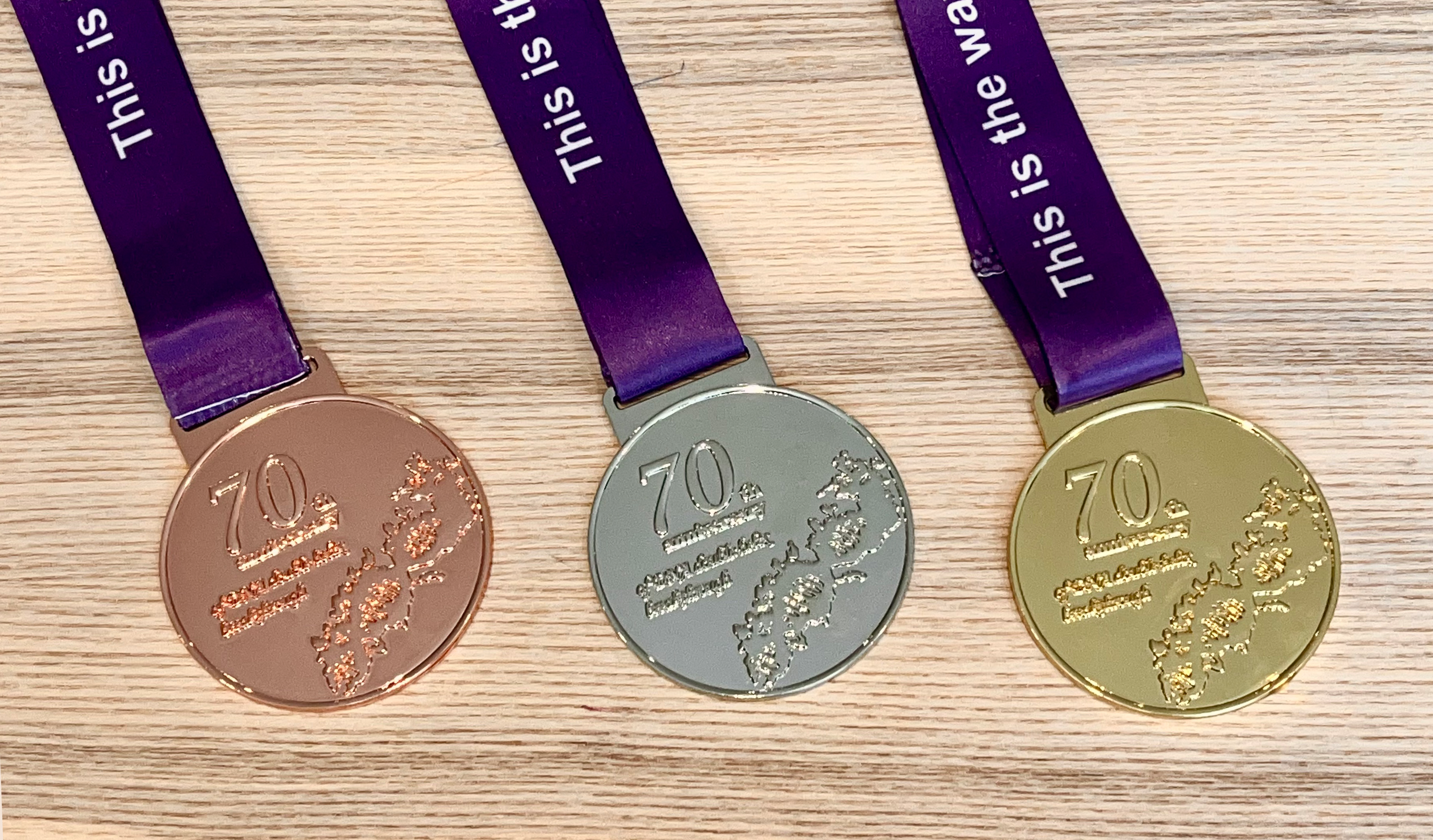 iDEC 2023 Medals Arrive in Cambridge